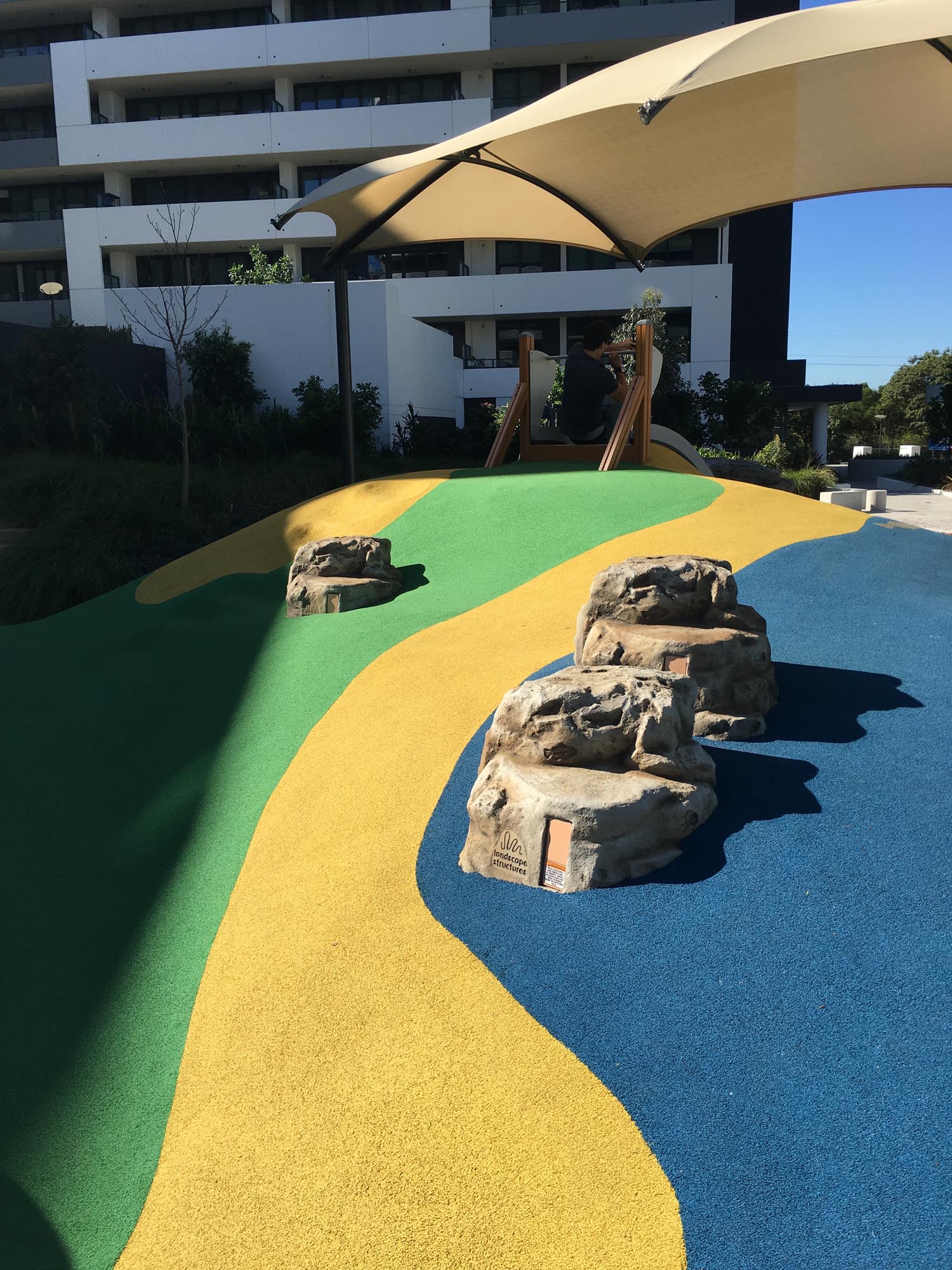 villagequayrhodesplaygroundplayequipmentembankmentslidensw Play